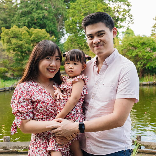 A happy family enjoying a candid photo session during their trip to Japan.